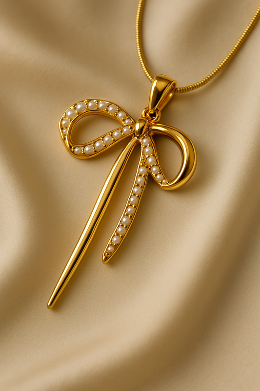 Graceful Gold Bow Pendant with Pearls